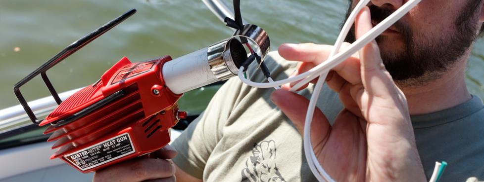 Using a heat gun with heat shrink tubing